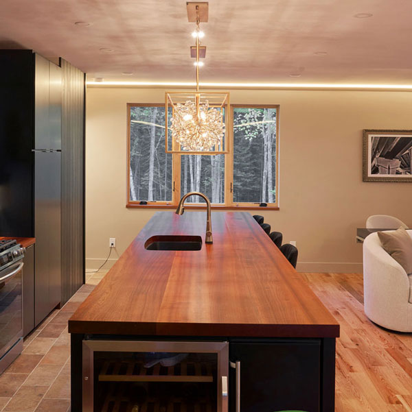 Custom new construction guest apartment kitchen by LandmarkAcadia Group &#38; Spiritcraft Furniture