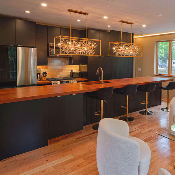 Custom new construction kitchen, cabinets, wall cladding and Sapele Island from LandmarkAcadia Group &#38; Spiritcraft Furniture